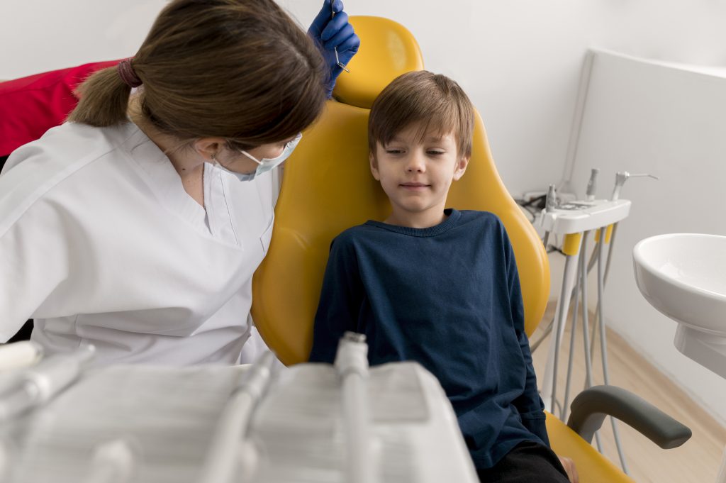 What are the signs that a baby or child may have a lip tie?